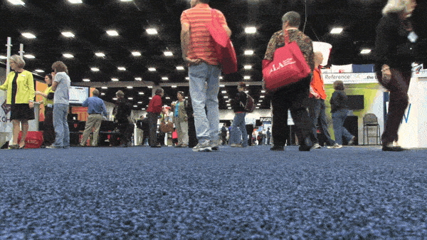 People gathering at a convention.