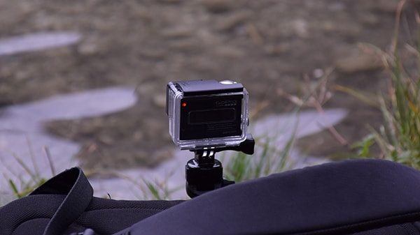 GoPro video camera shooting video in backpack.