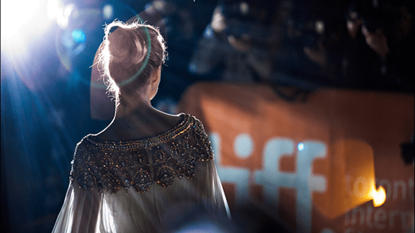 Model walking down Toronto film festival runway