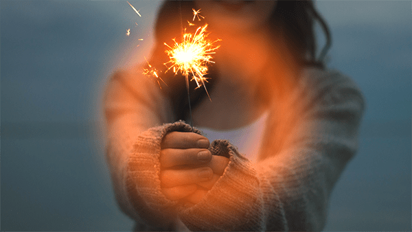 Light Ring transition from Transitions 3 applied to an image of a woman holding sparkler.