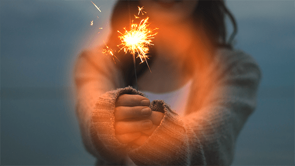 Light Right Transition Light Ring transition from Transitions 3 applied to an image of a woman holding sparkler.